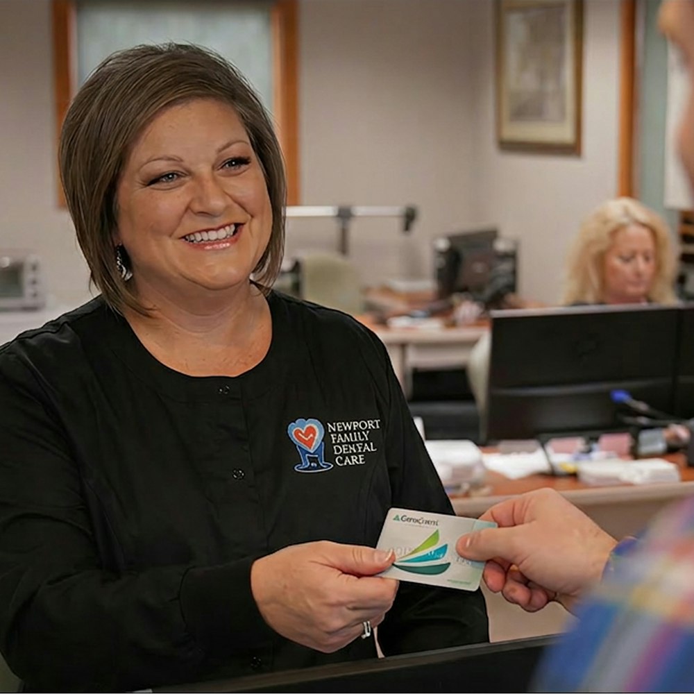 staff member accepting CareCredit credit card