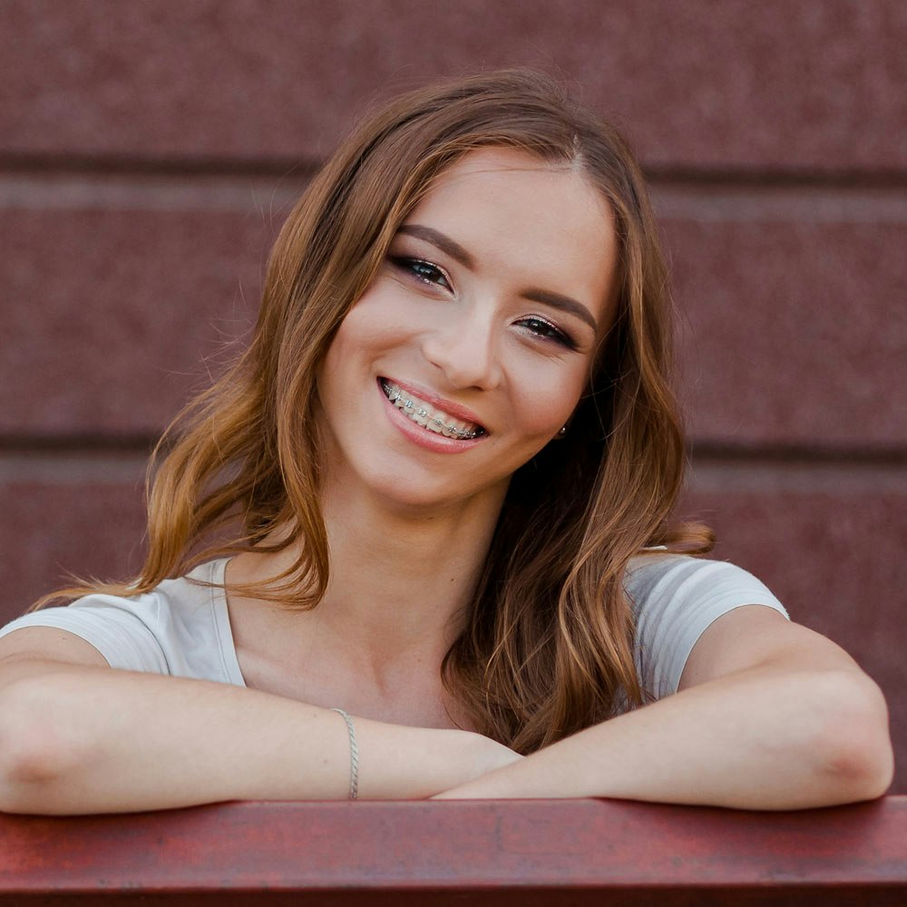 Woman smiling with braces