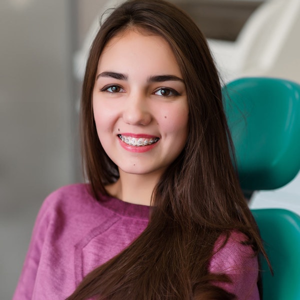Smiling lady wearing braces