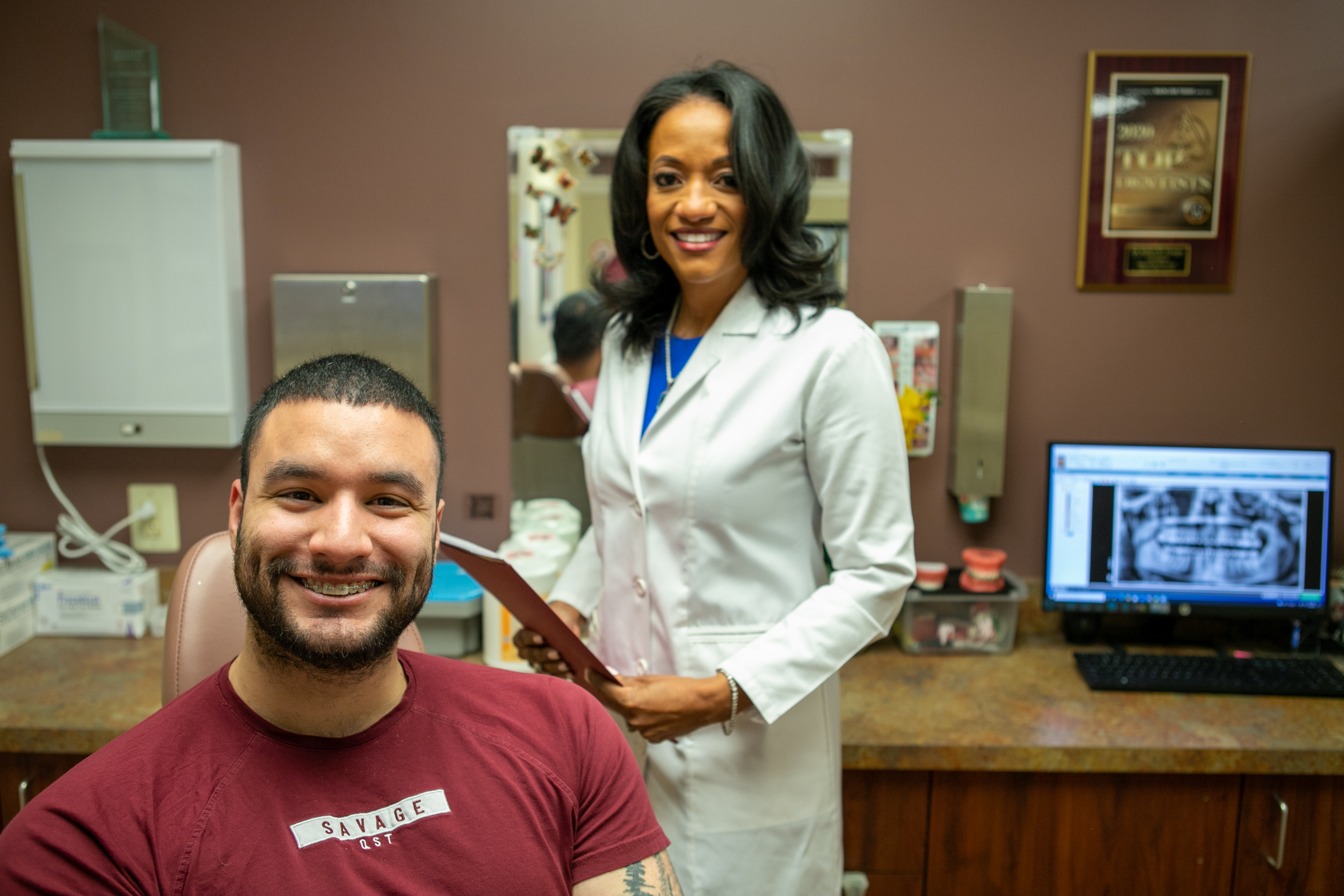 Dr. Kellyn Hodges with a smiling patient