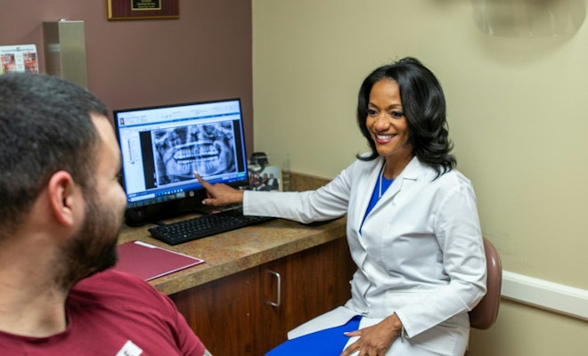Dr. Hodges in a consultation with a patient