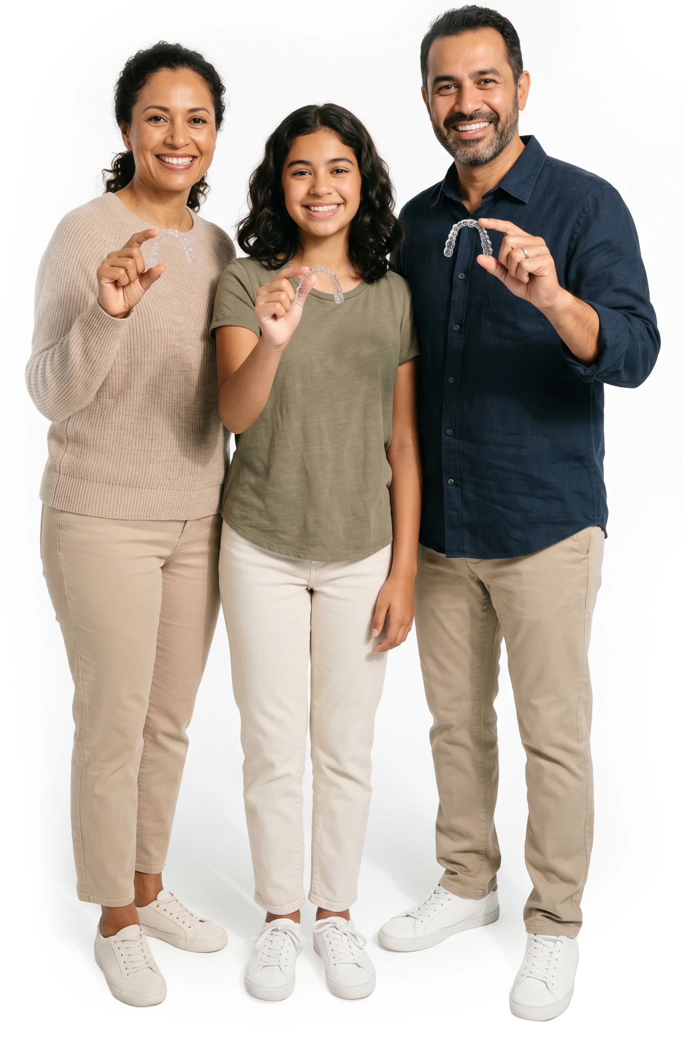 Family holding invisalign trays