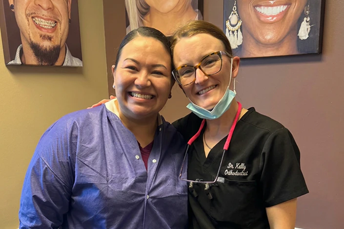 happy patient with her orthodontist