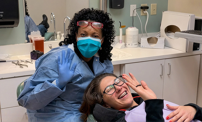 Dr. Hodges with braces patient