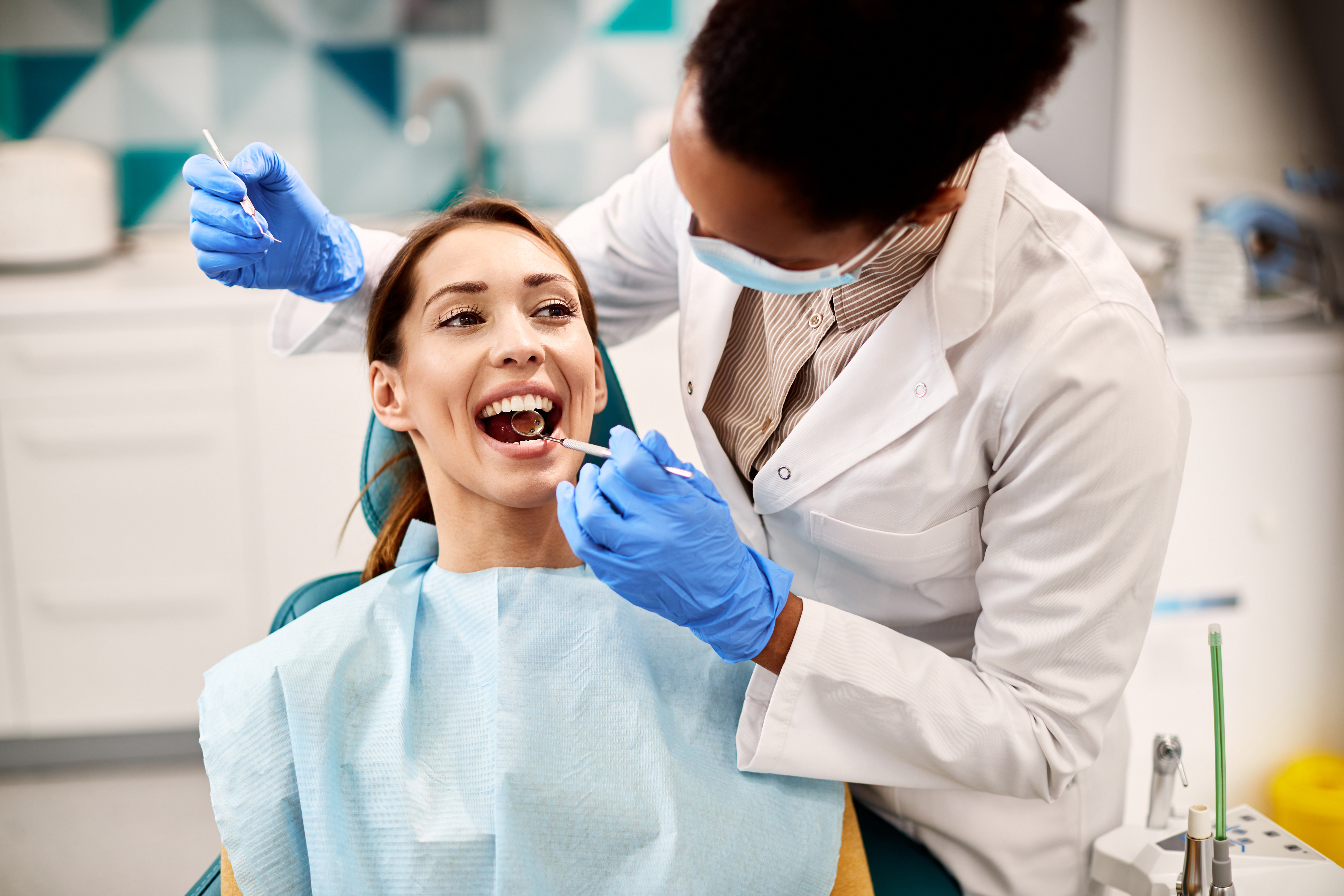 Woman getting dental exam