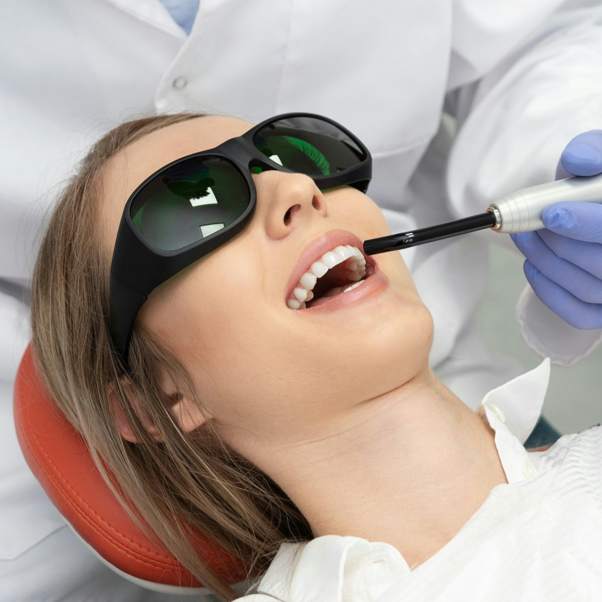 woman getting laser dentistry
