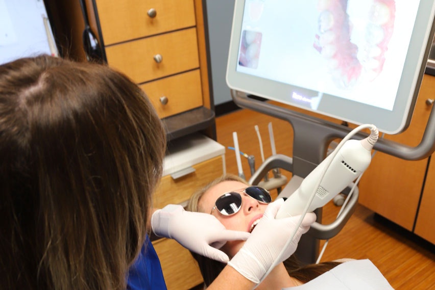 Tech using the iTero 3D Digital Scanner