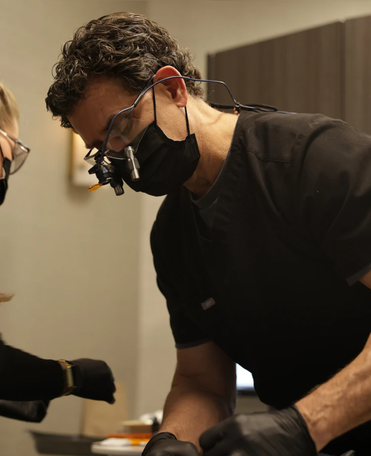 Dr. Nabors working on a patient