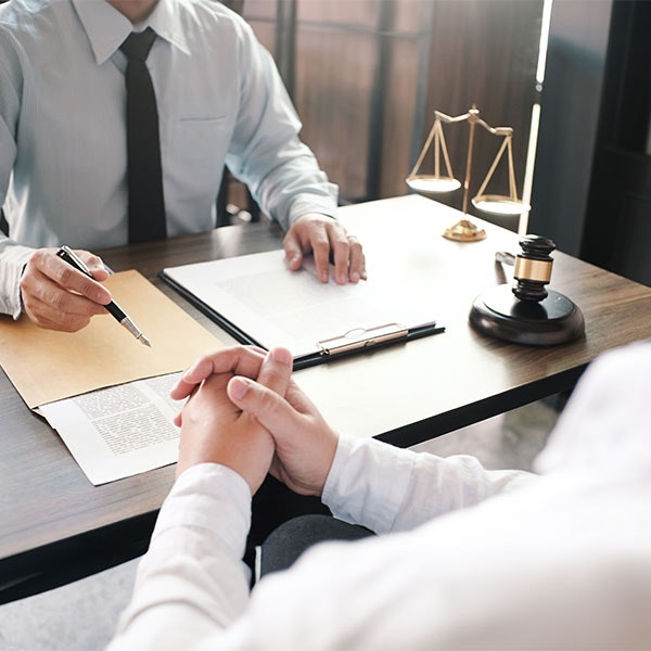 Person meeting with their attorney