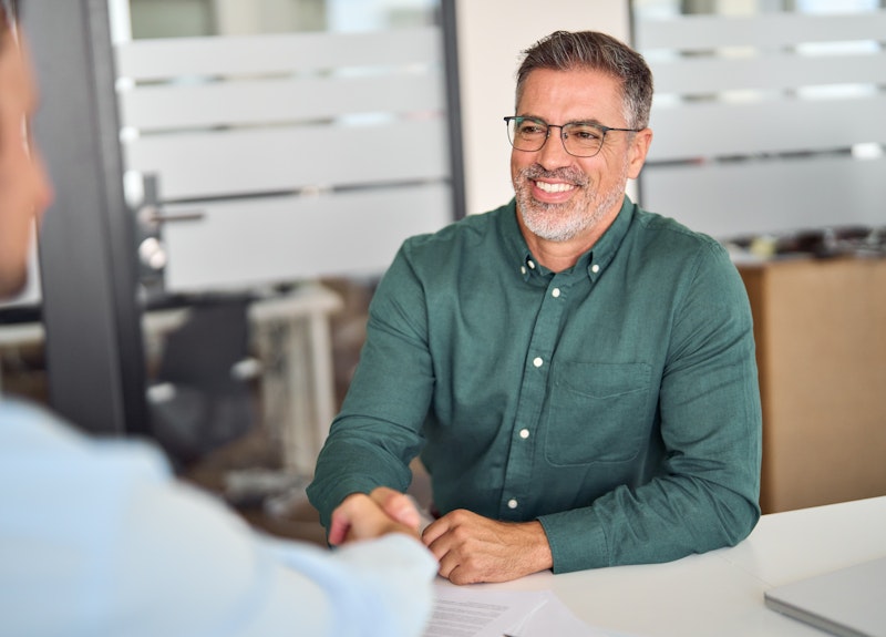 Lawyer shaking hands with businessman