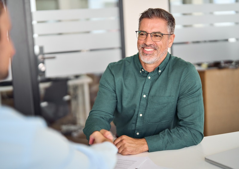 Lawyer shaking hands with businessman