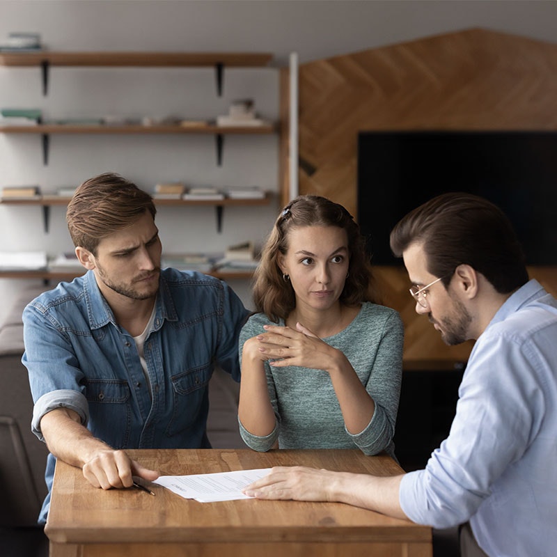 couple arguing with landlord 