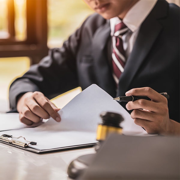 Arbitrator reviewing case facts