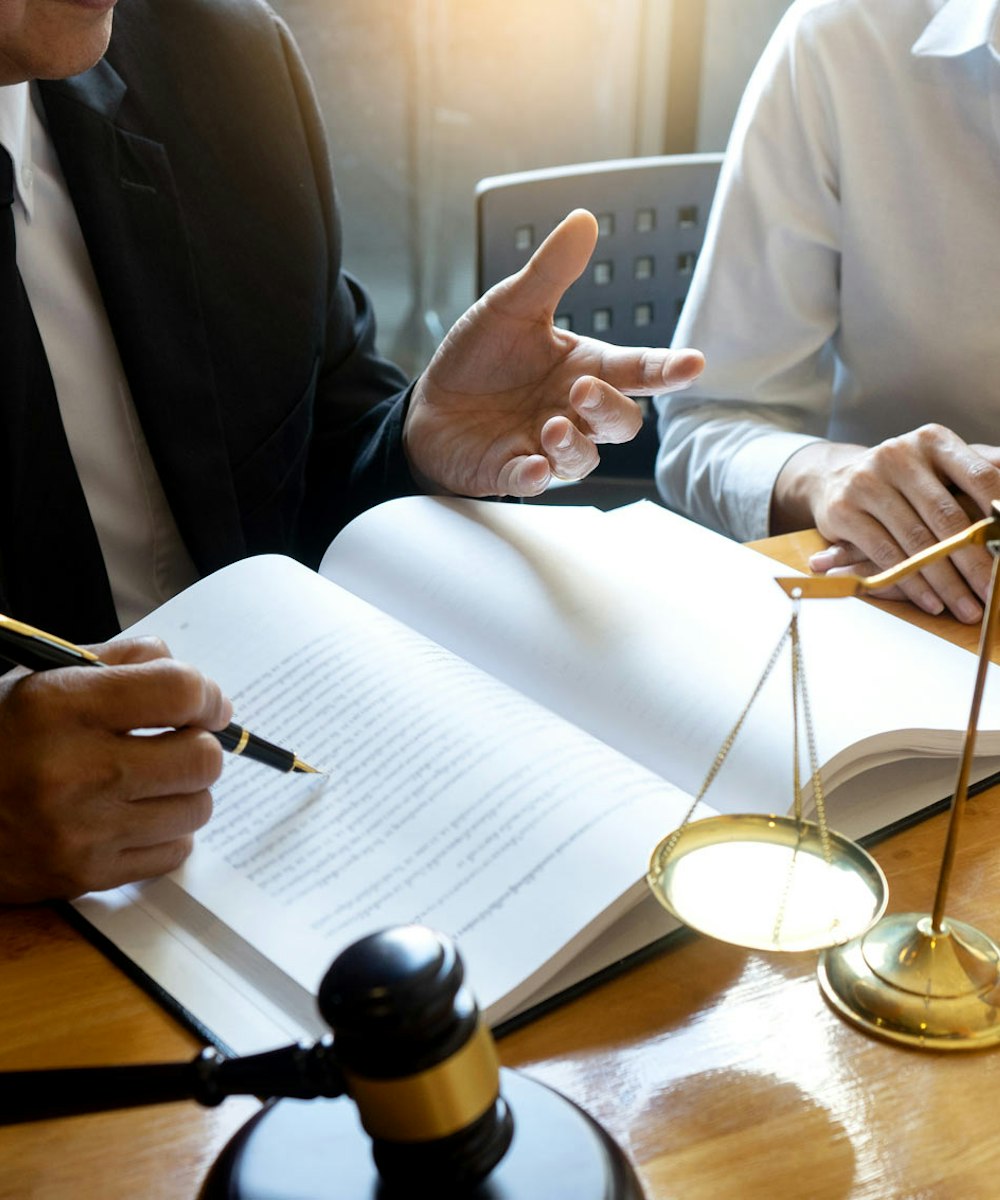 Lawyer talking to client