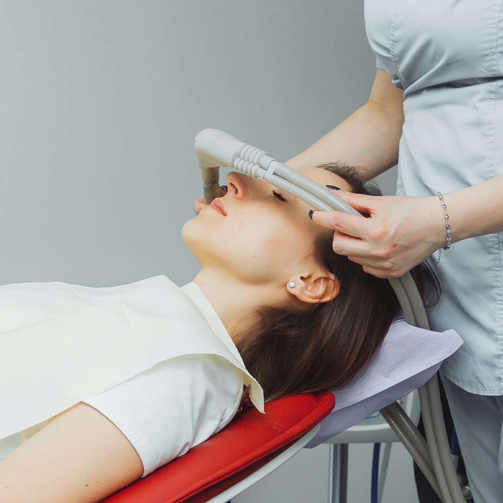 relaxed patient undergoing dental sedation