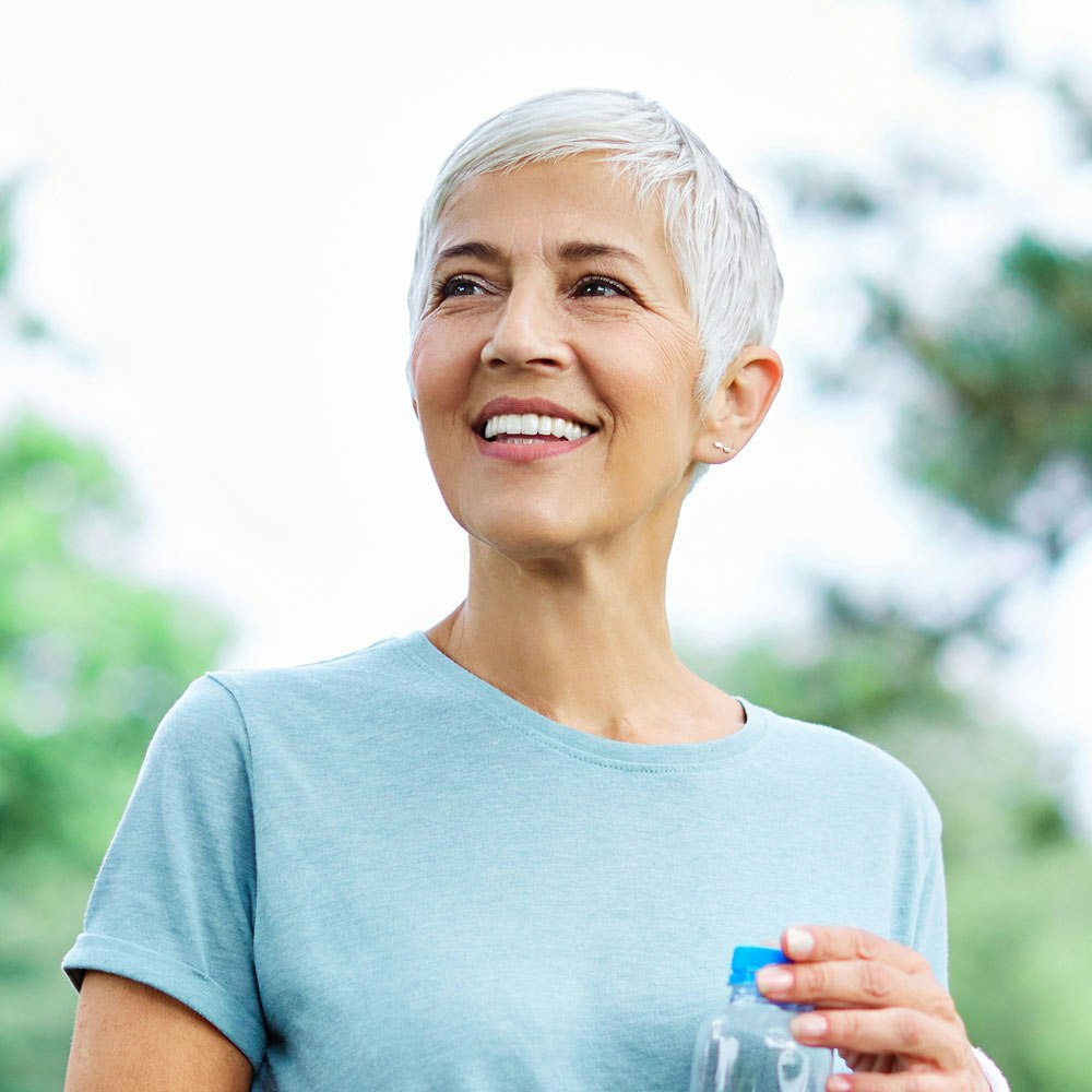 woman with dentures smiling