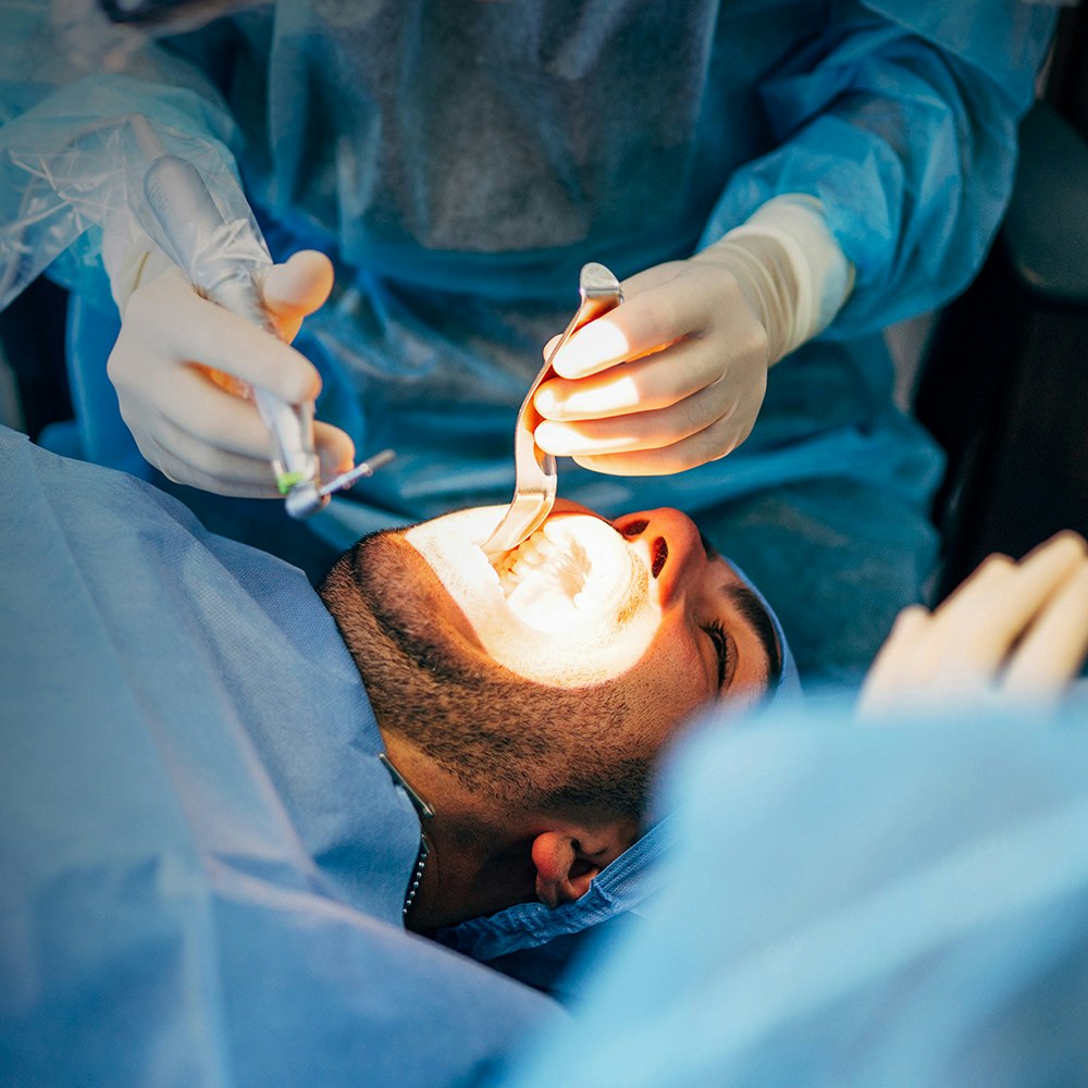 oral surgeon performing a bone graft