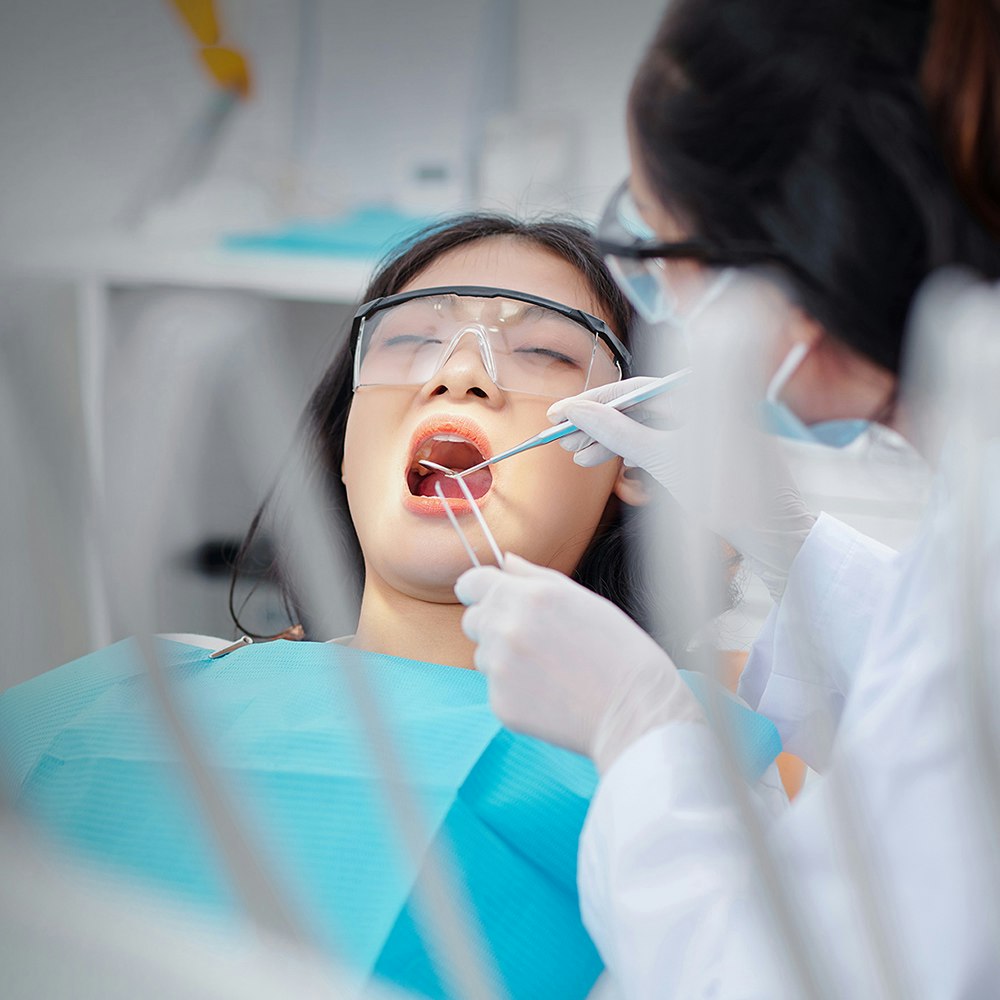 Patient receiving a dental filling