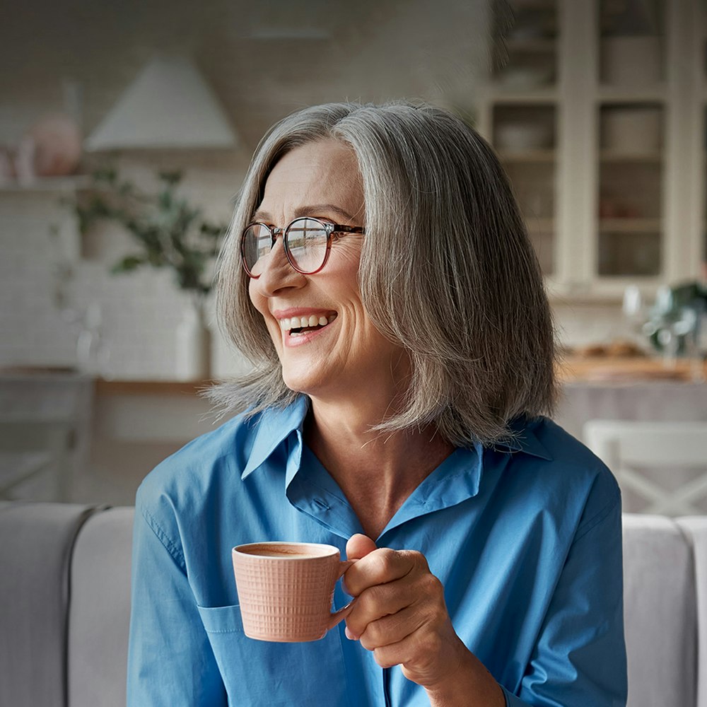 An older patient in a dental chair after same-day dental implant placement