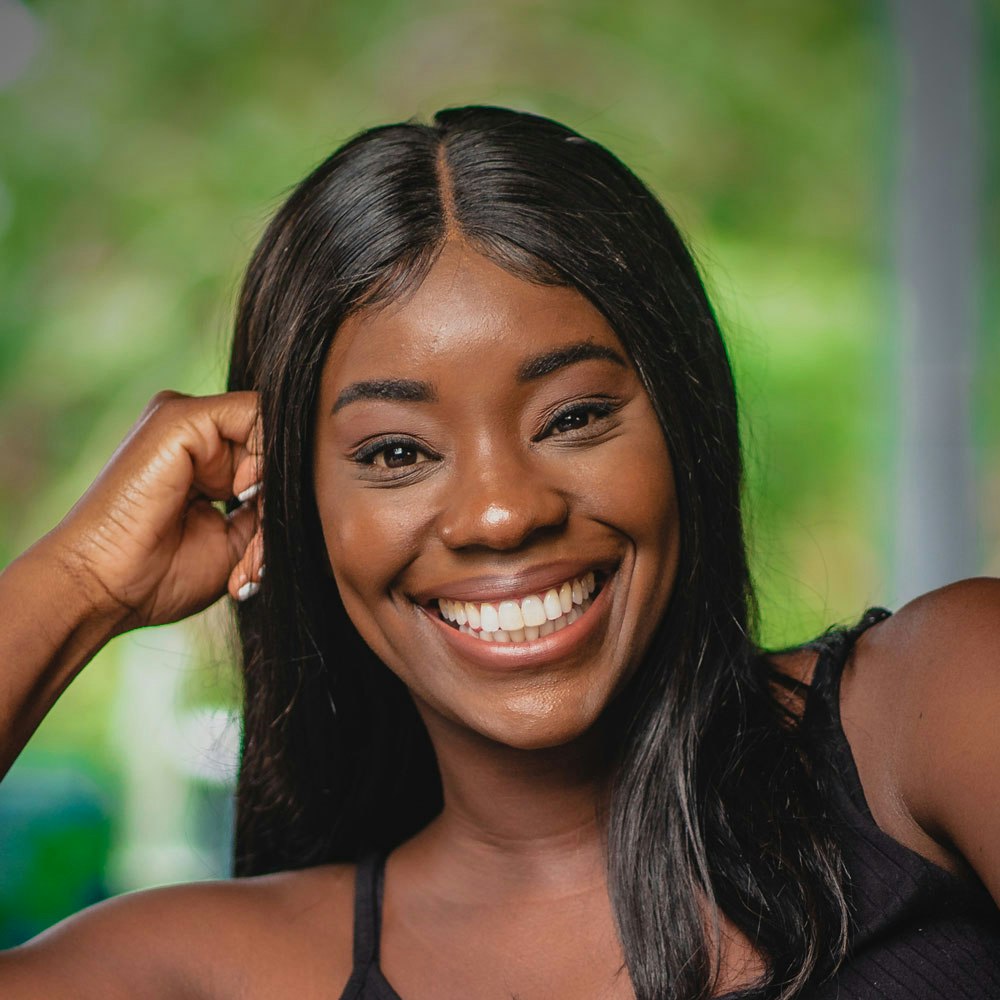 Smiling woman sitting on couch
