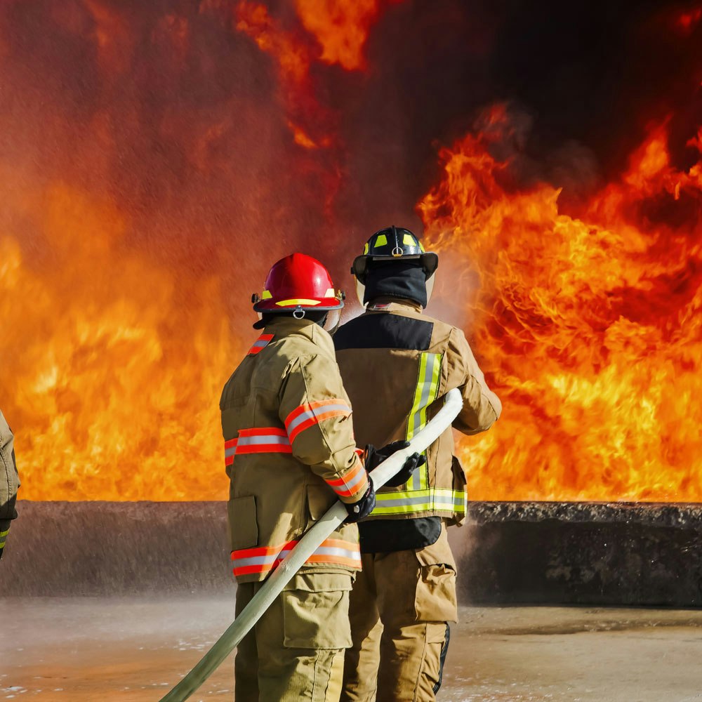 Firefighter looking at a gas explosion
