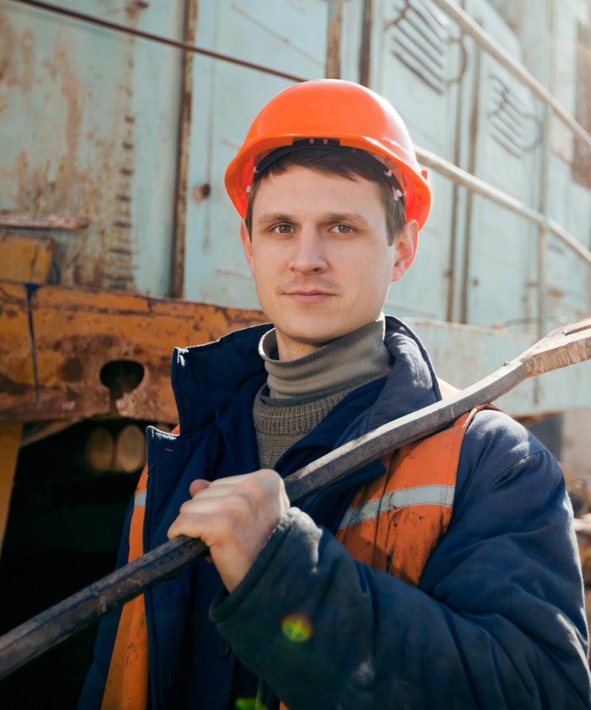 Construction worker holding shovel
