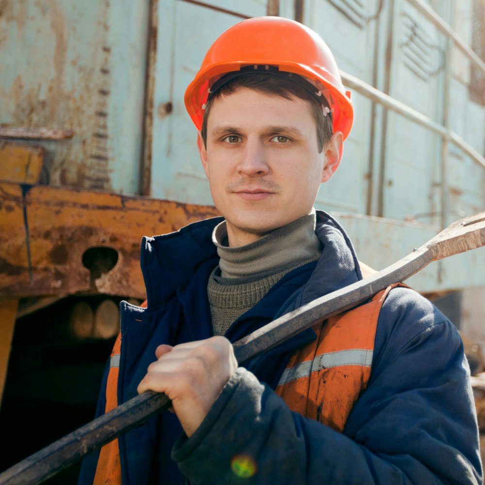 Construction worker holding shovel
