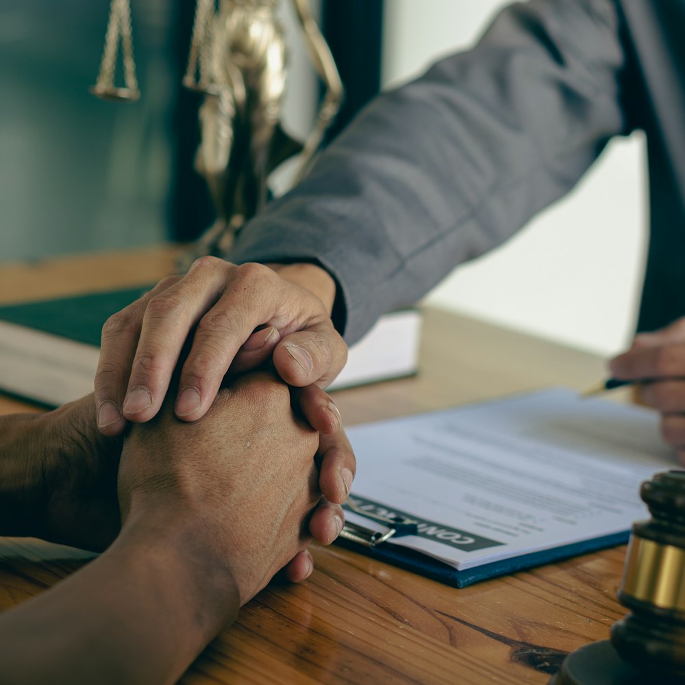 Lawyer comforting client