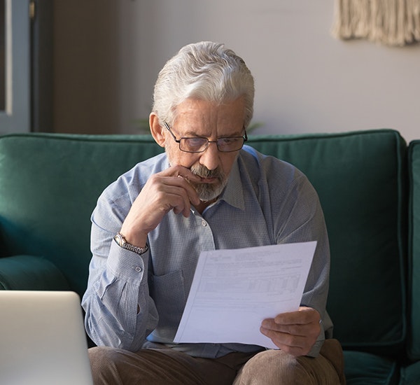 man wearing reading glasses