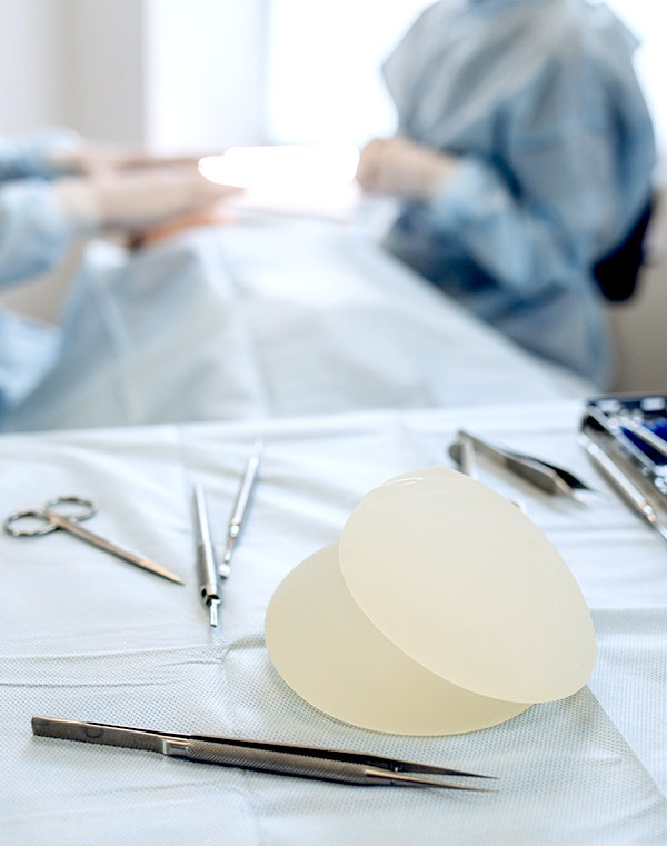 Breast implants on a table during surgery