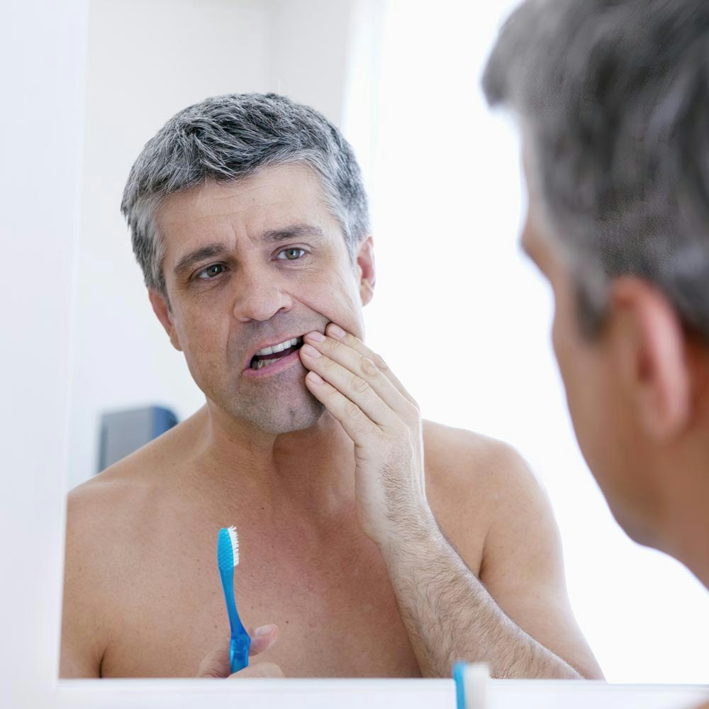 man looking in the mirror