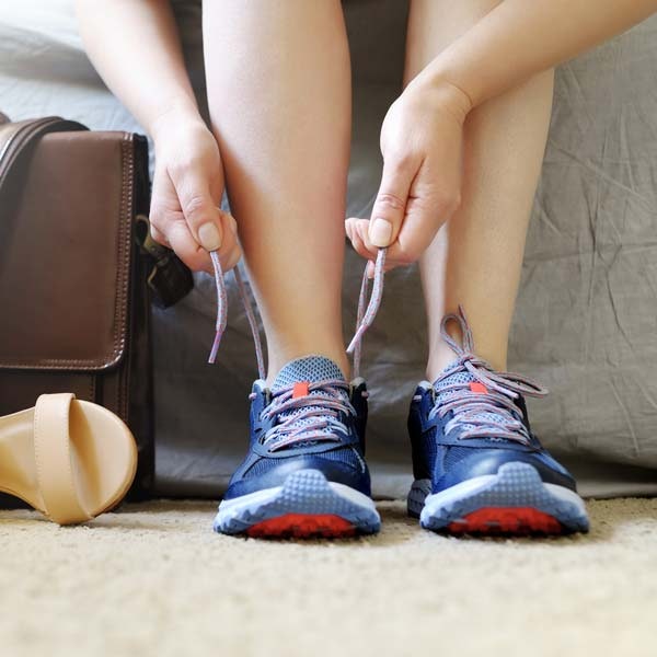 Person tying their shoe
