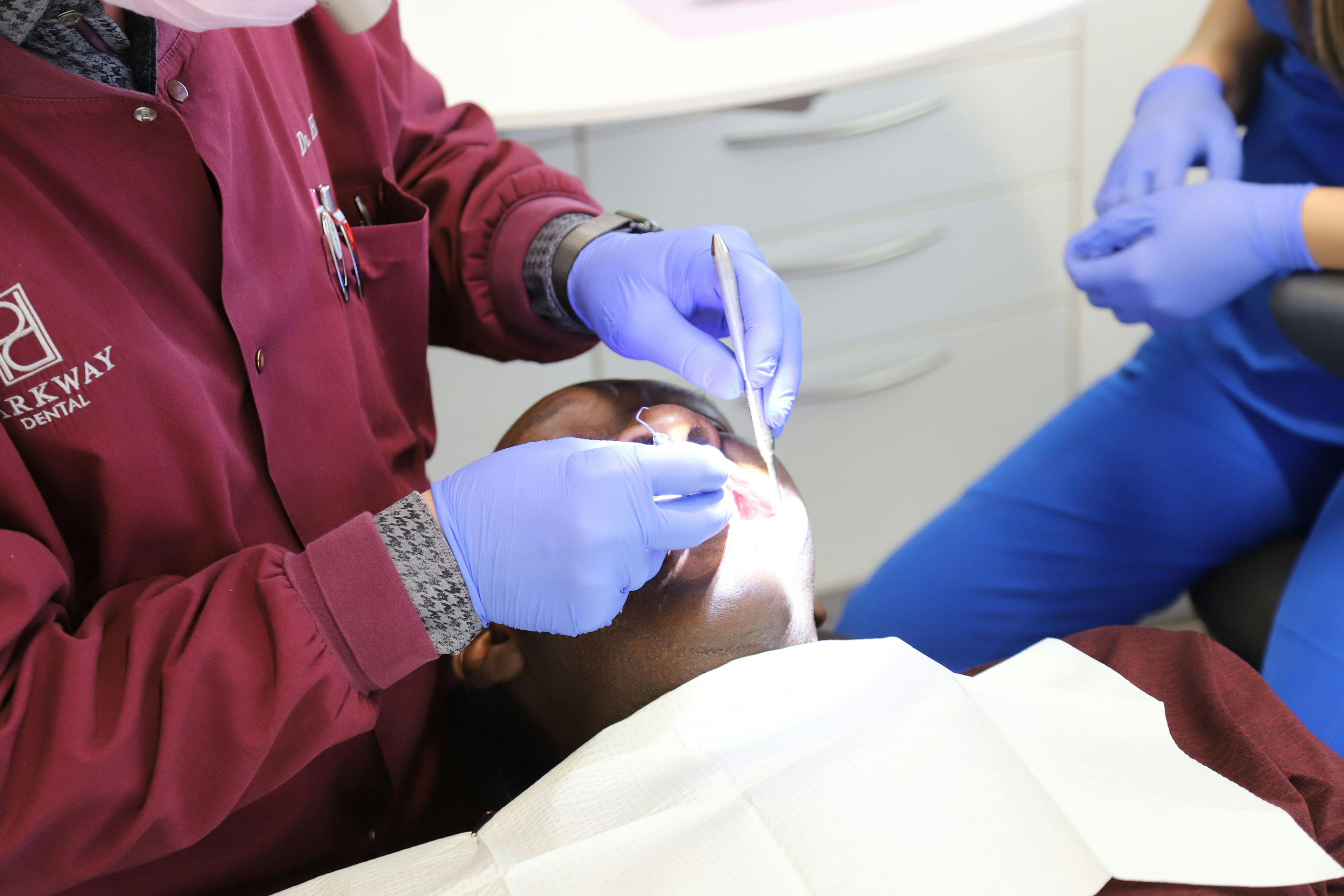Dr. Michael D. Haight with a patient in the dentist's chair