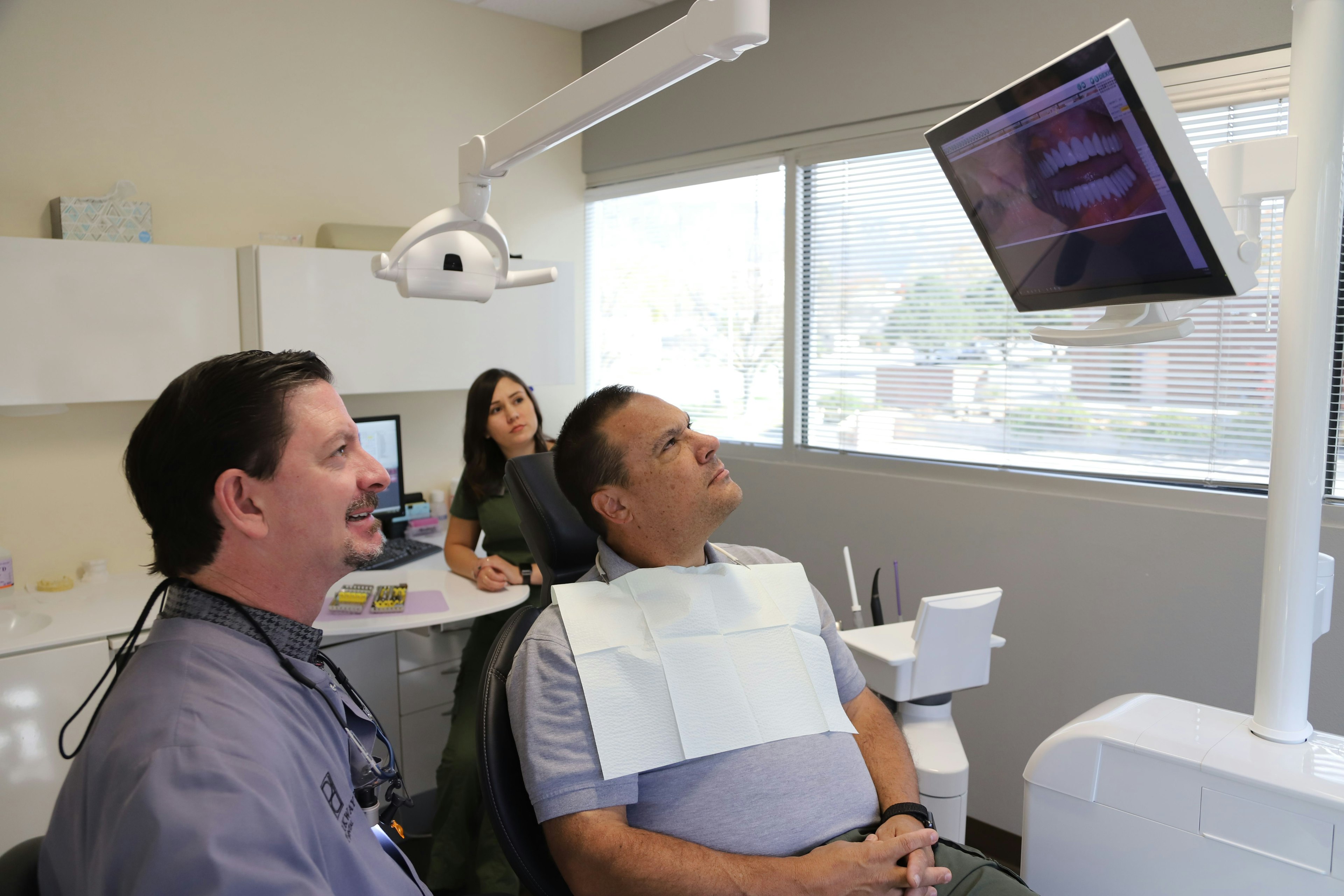 Dr. Haight caring for a dental patient