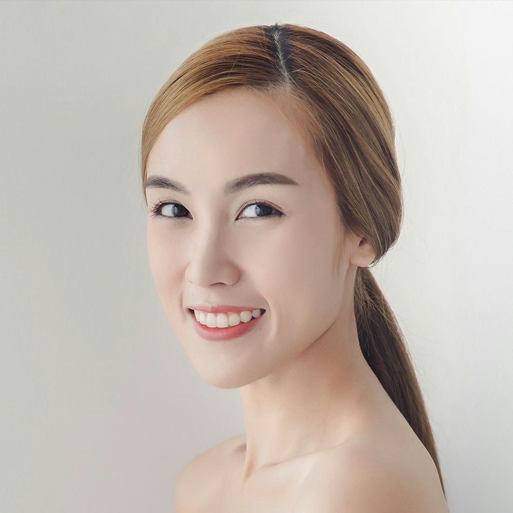 Smiling woman with clear skin