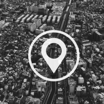 Google pin over city