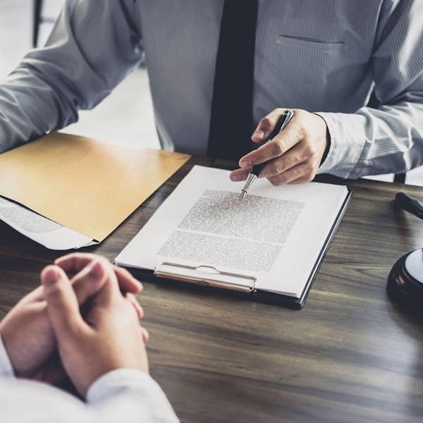 People discussing documents
