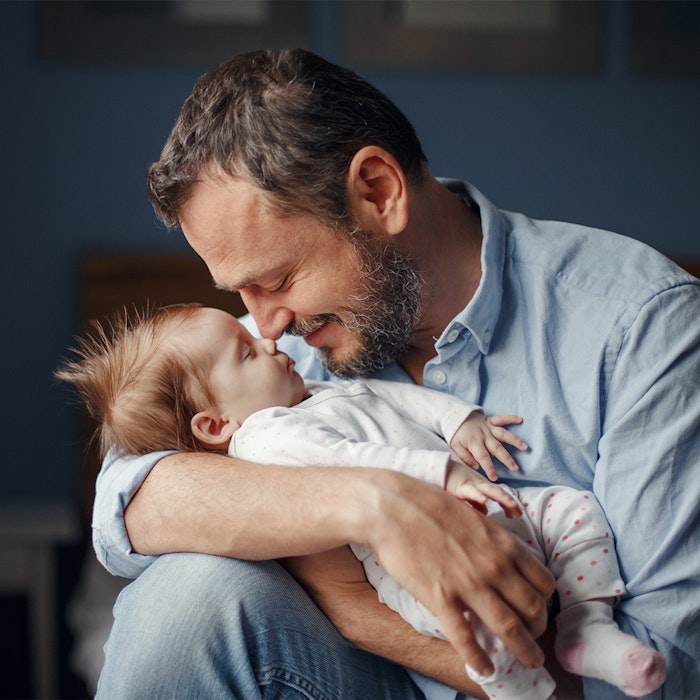 Father holding baby