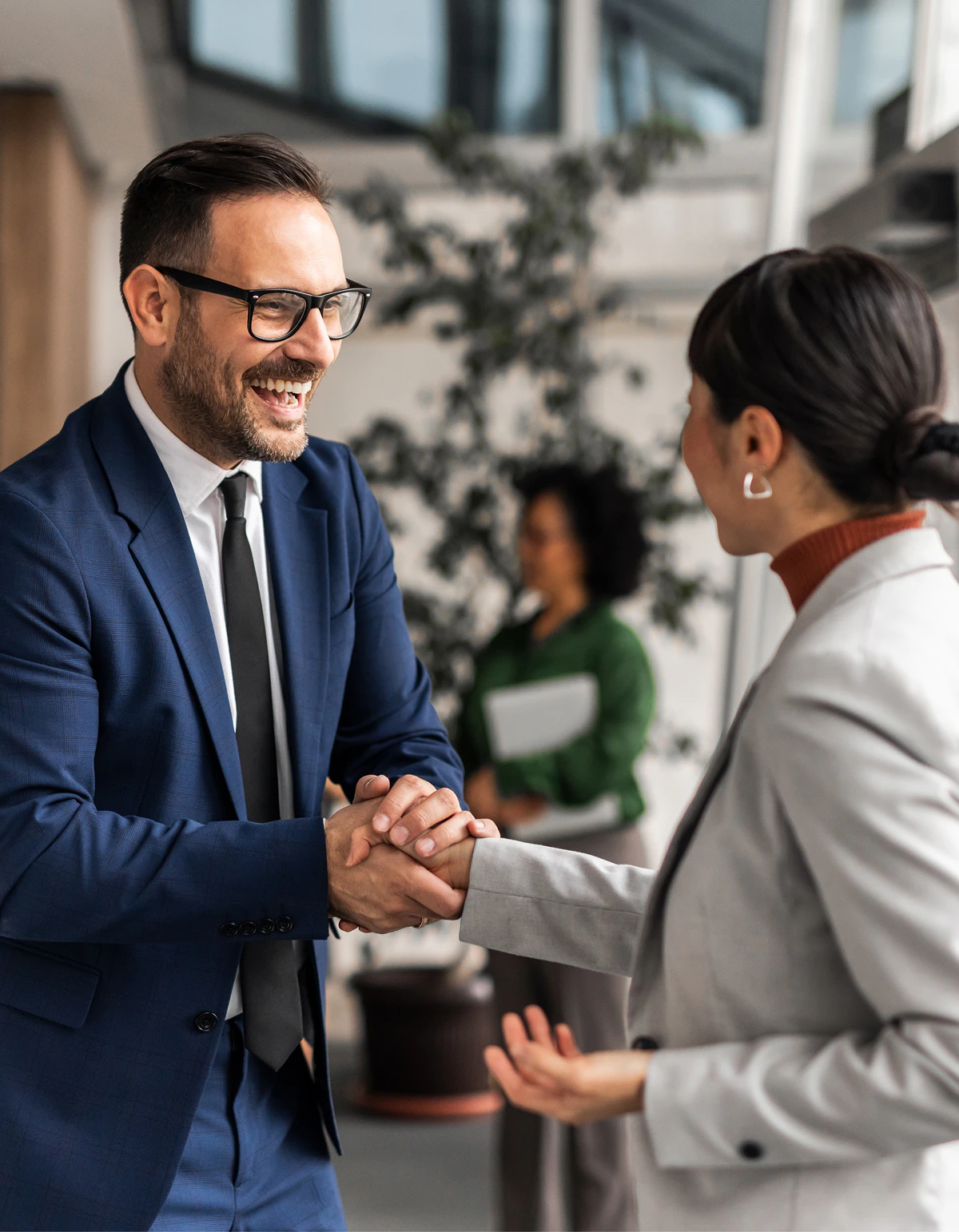 Client and attorney shaking hands
