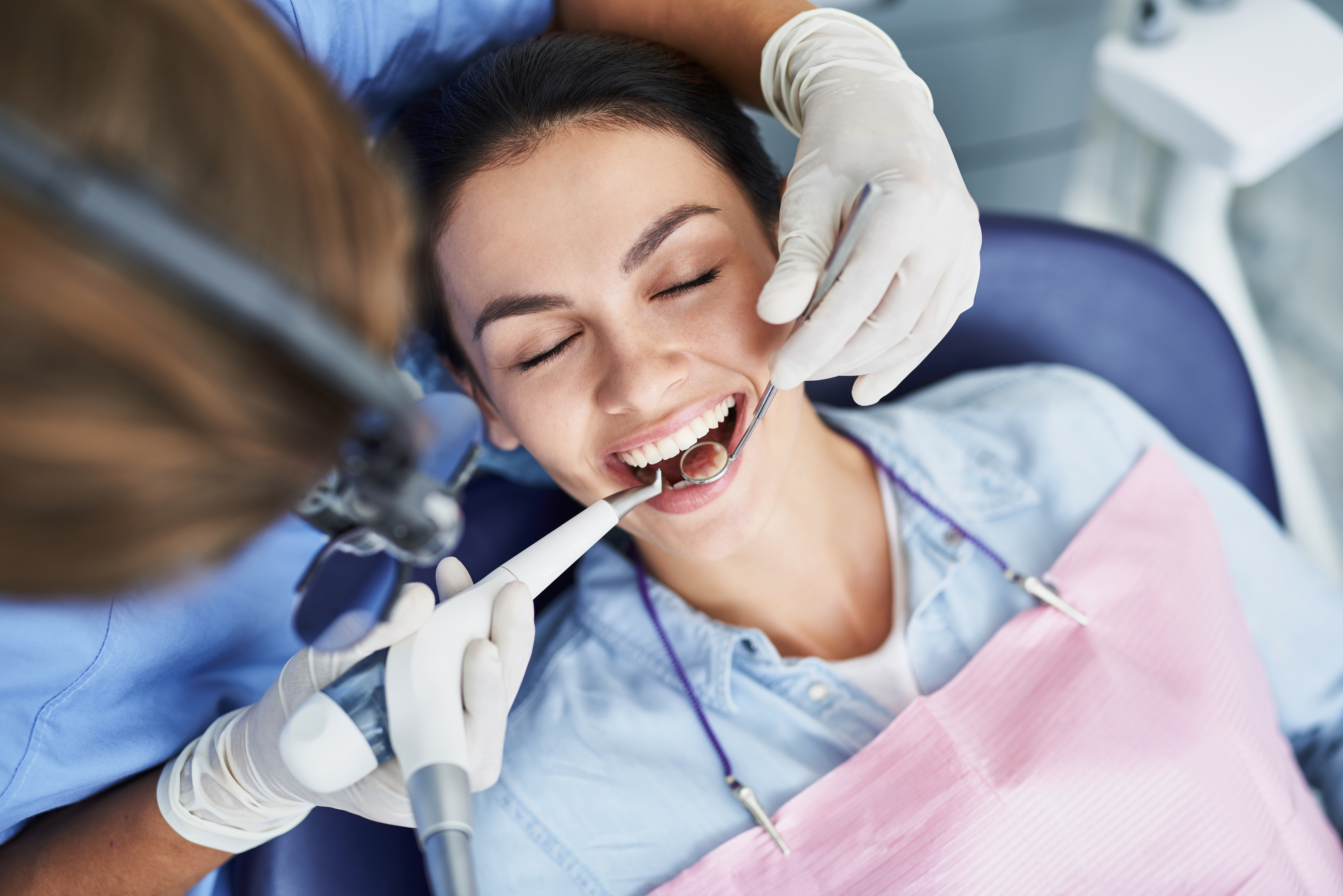 Woman getting a dental cleaning
