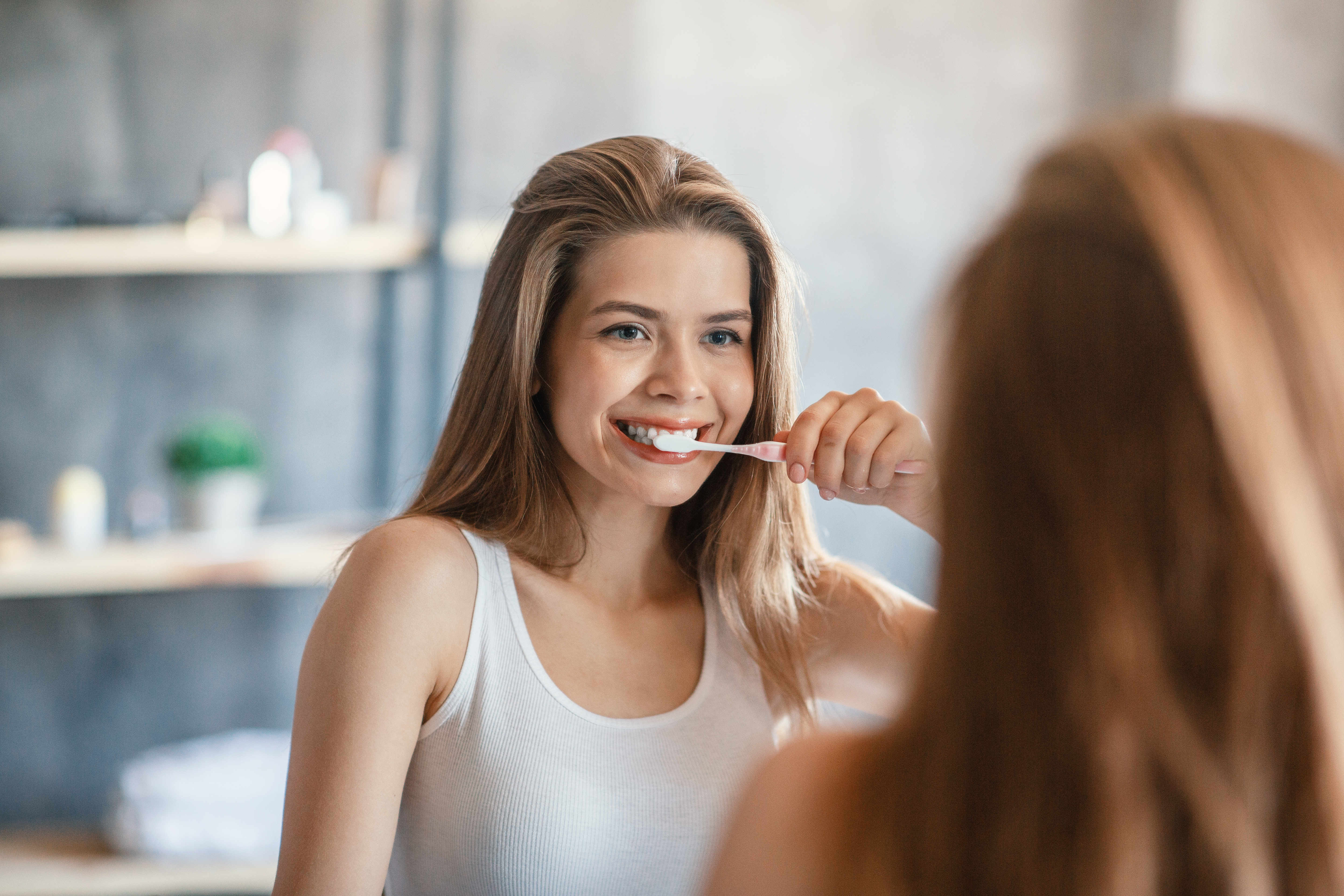 Woman brushing her teeth