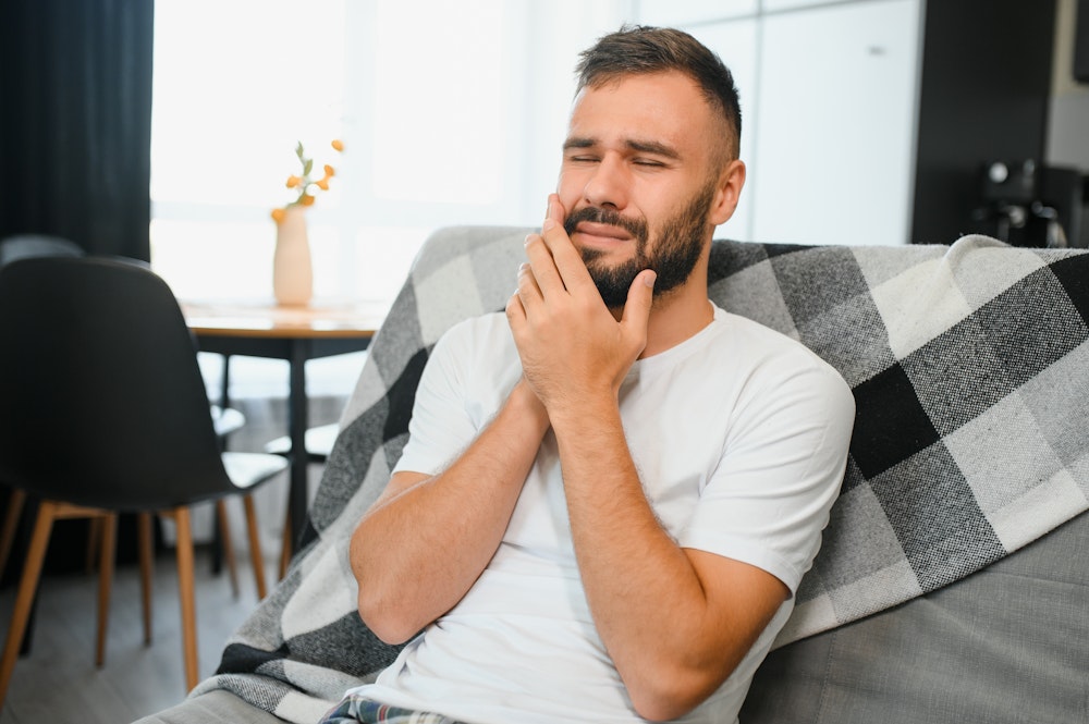 Man in jaw pain