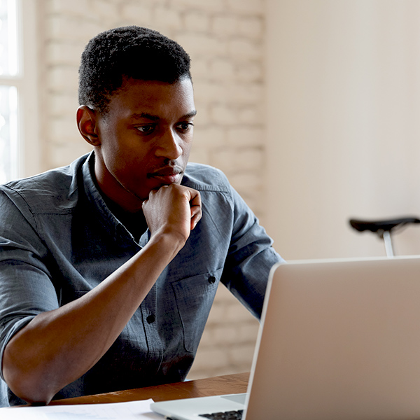Man looking at a laptop screen