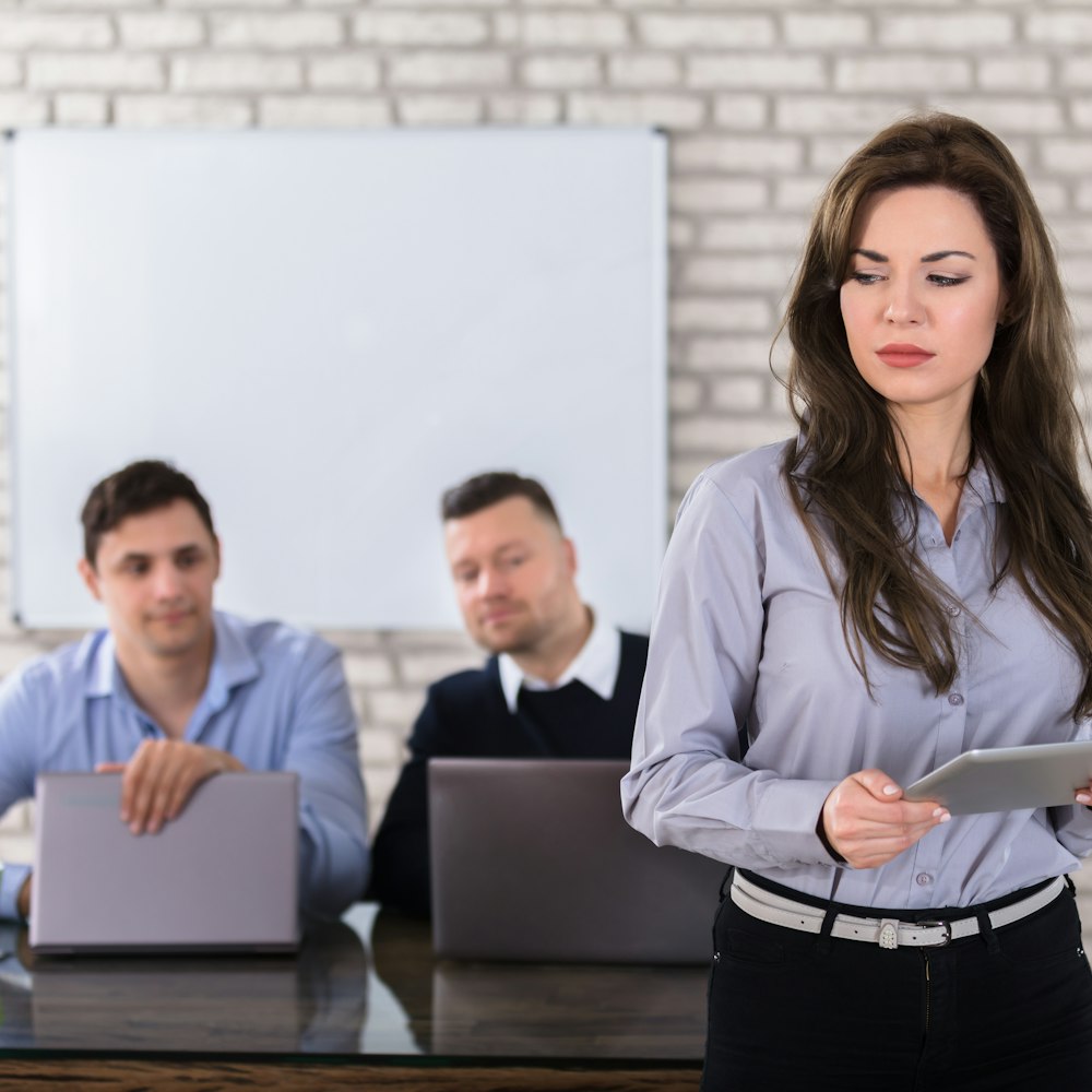 men staring at female coworker's backside