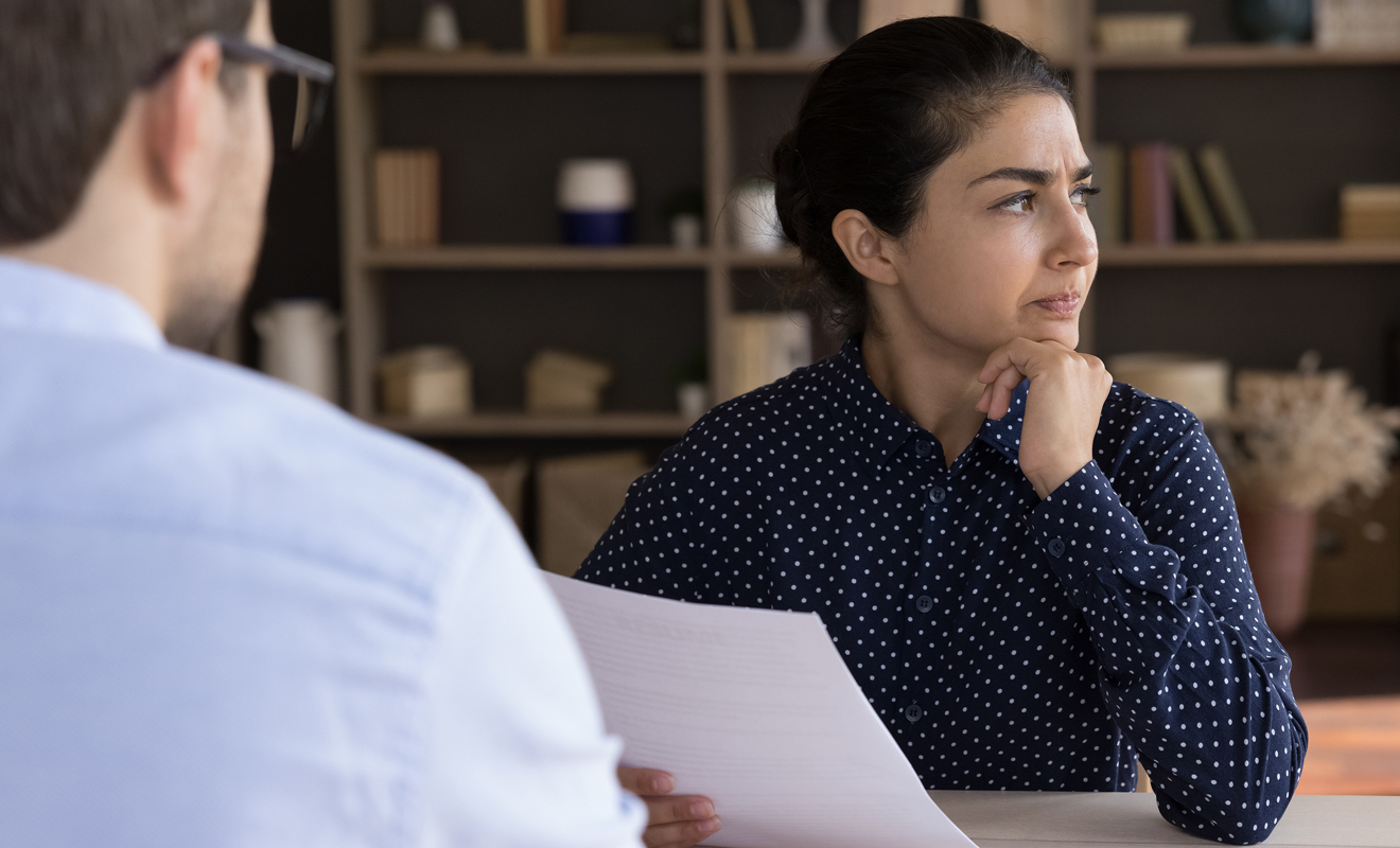 woman frowning during job interview