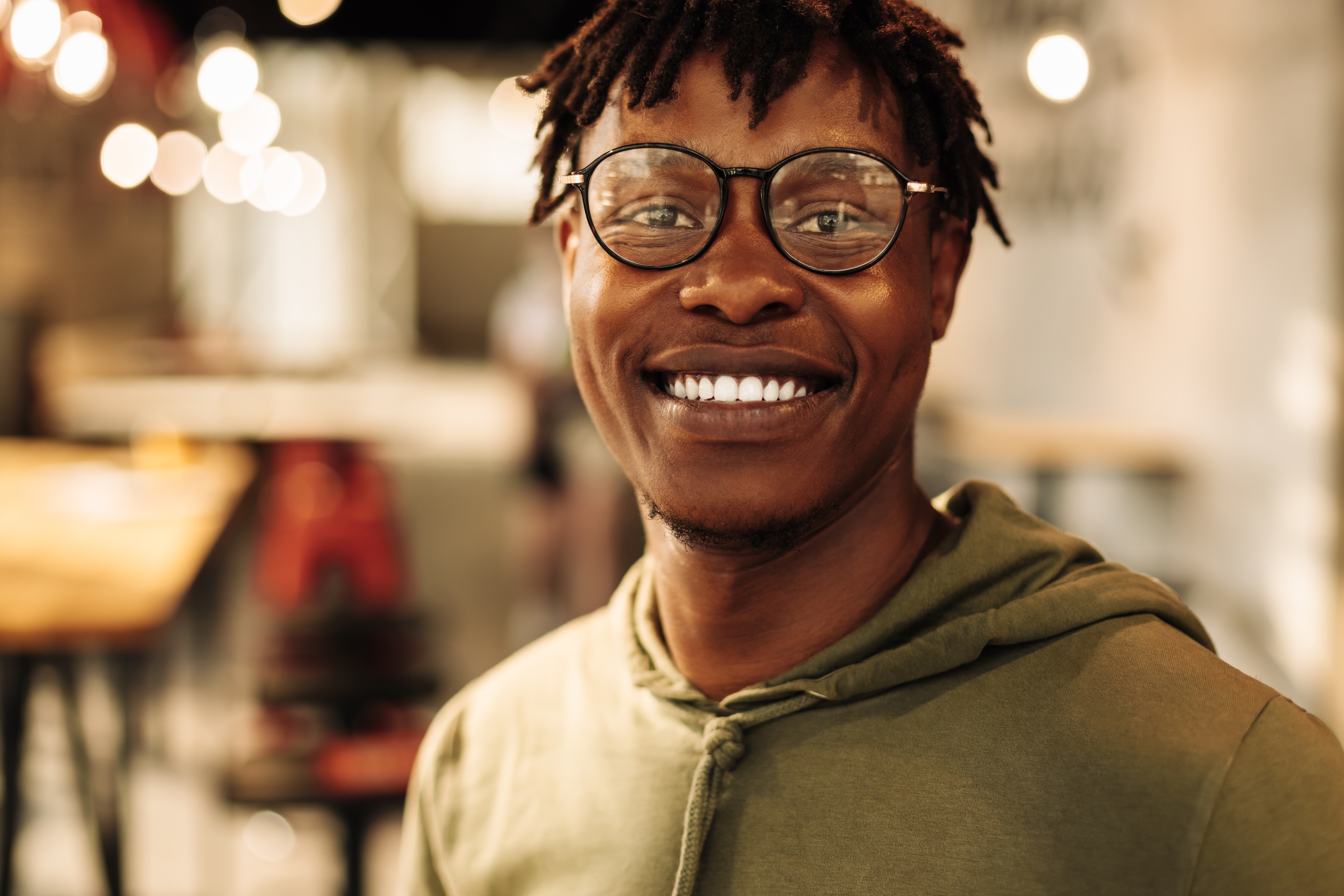 Man in glasses smiling