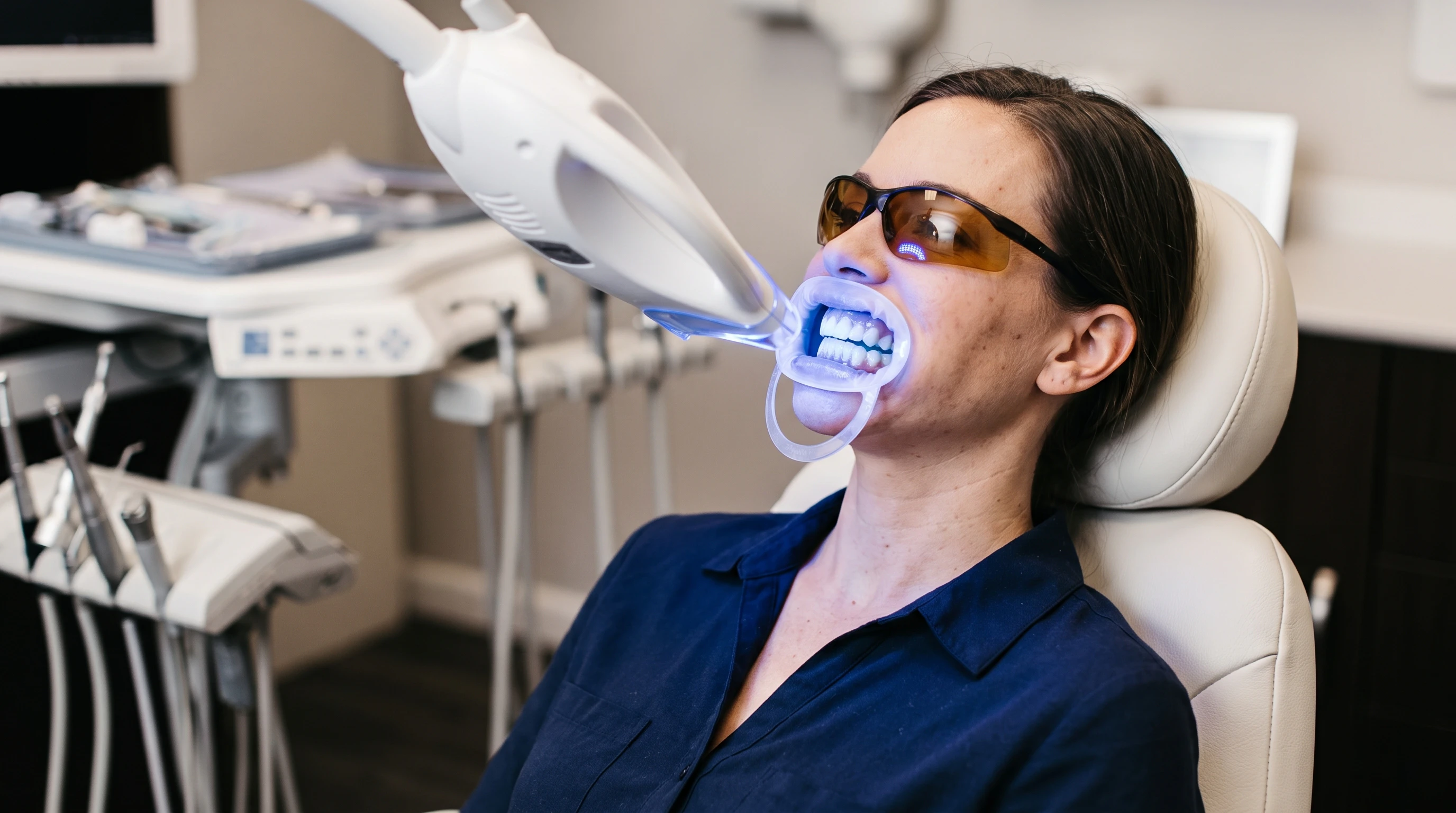 woman having teeth whitened