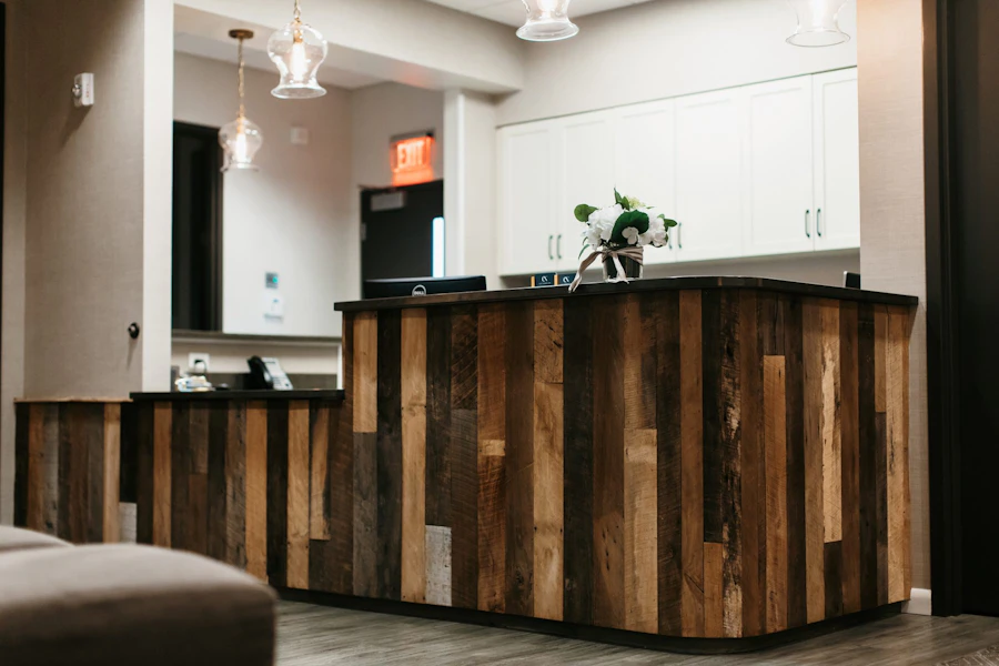 Reclaimed wood reception desk at the Nashville office