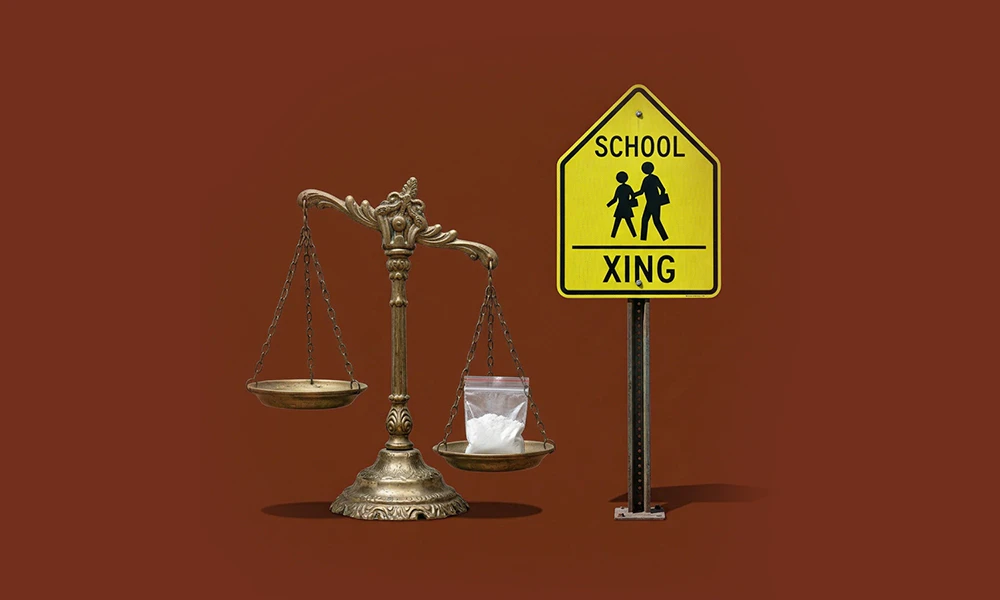 powder drugs in a plastic bag, legal scales, and a school crossing sign