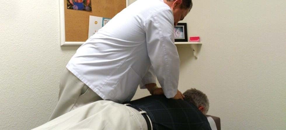 Dr. Langford performing an adjustment on a patient